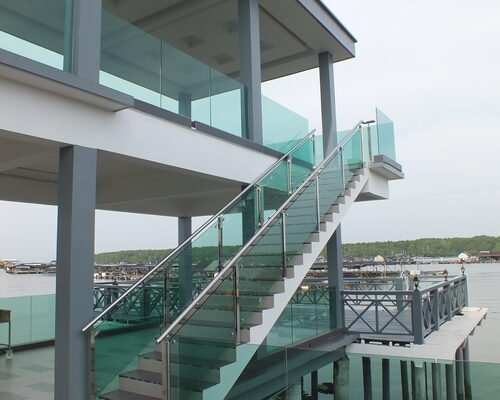 Glass staircase and balcony at TAN Castle